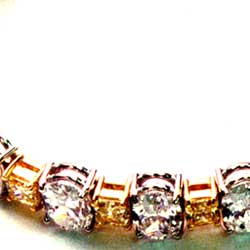 Oval White Diamonds and Yellow Radiants in Two-tone platinum and 18K Yellow Bracelet
