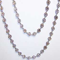 Platinum and Bezel-Set Diamond necklace. 60 inch Length